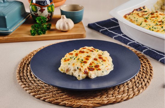 Receita de Til&aacute;pia Gratinada com Molho Branco e Batatas